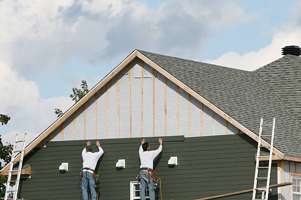Professional Emergency Siding Repair technician working in Victoria, MN